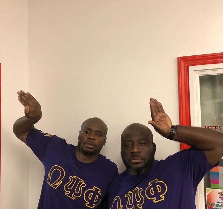 Epsilon Alpha Alpha of Omega Psi Phi crosses two new members.